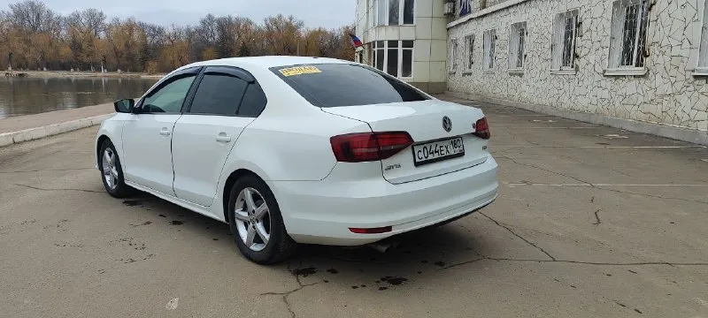 Продам volkswagen jetta 1.4tsi (150л/с) 2016 года выпуска пробег 124000 миль коробка автомат (aisin) автомобиль в родном окрасе. есть пару вмятин на порогах и нюансы по переднему бамперу. была произведена замена масла в двигателе и замена ремня и роликов грм. 2 комплекта резины я хозяин. енакиево цена 1200000₽ +79493570774 📲 tg: @se_pro87 📞 звоните: +7(949)3570774 - фотография - 6