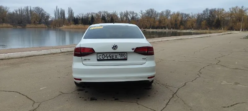 Продам volkswagen jetta 1.4tsi (150л/с) 2016 года выпуска пробег 124000 миль коробка автомат (aisin) автомобиль в родном окрасе. есть пару вмятин на порогах и нюансы по переднему бамперу. была произведена замена масла в двигателе и замена ремня и роликов грм. 2 комплекта резины я хозяин. енакиево цена 1200000₽ +79493570774 📲 tg: @se_pro87 📞 звоните: +7(949)3570774 - фотография - 7