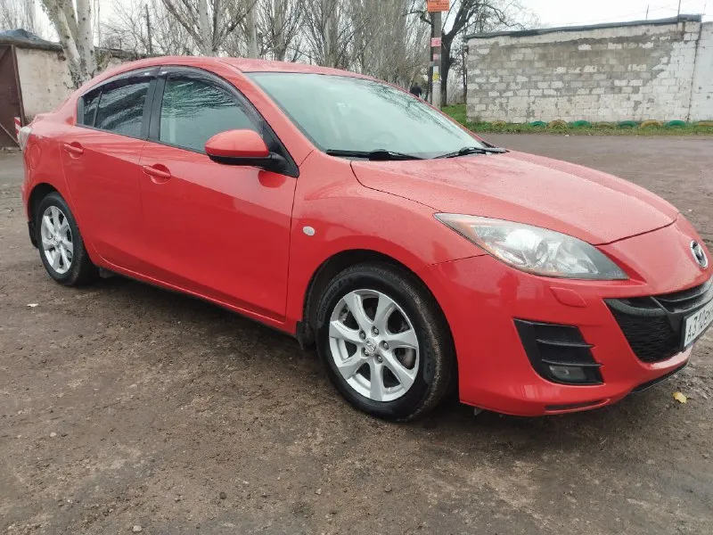 Mazda 3 mazda 3 год выпуска 2011 пробег 178 тысяч км. двигатель 1.6 в идеальном состоянии в идеальном состоянии кузов в родном окрасе (бампера имеют вторичный окрас) стекла родные включая лобовое резина новая (только лето) климат контроль холодит отлично ходовая вложений не требует машина находится в мариуполе цена 920 тысяч рублей +79497260544 📲 tg: 6356 📞 звоните: +7(949)7260544 - фотография - 2