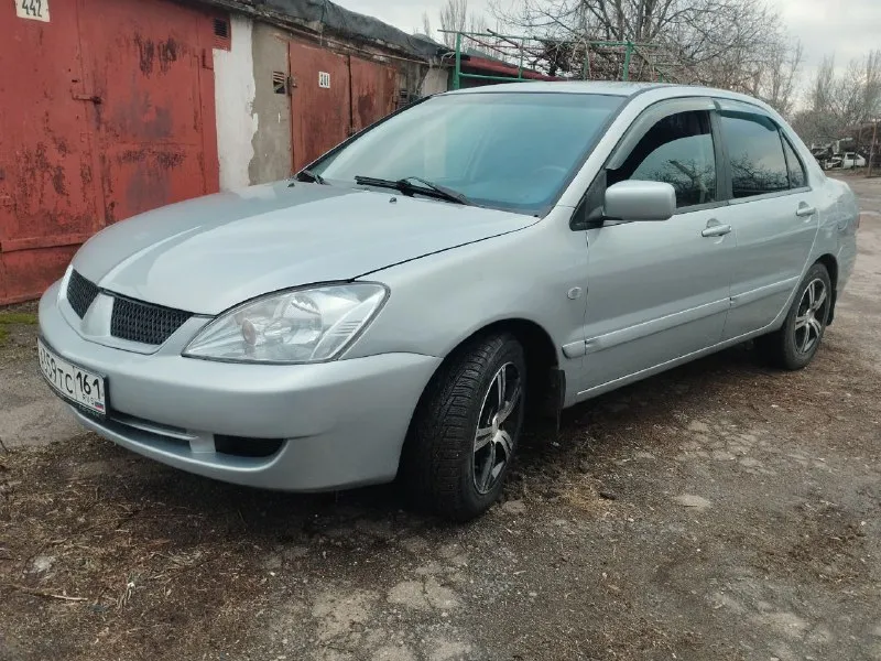 Mitsubishi лансер 9 mitsubishi lancer 9 год выпуска 2005 пробег 248 тысяч км двигатель 1.6 в отлично... - фотография