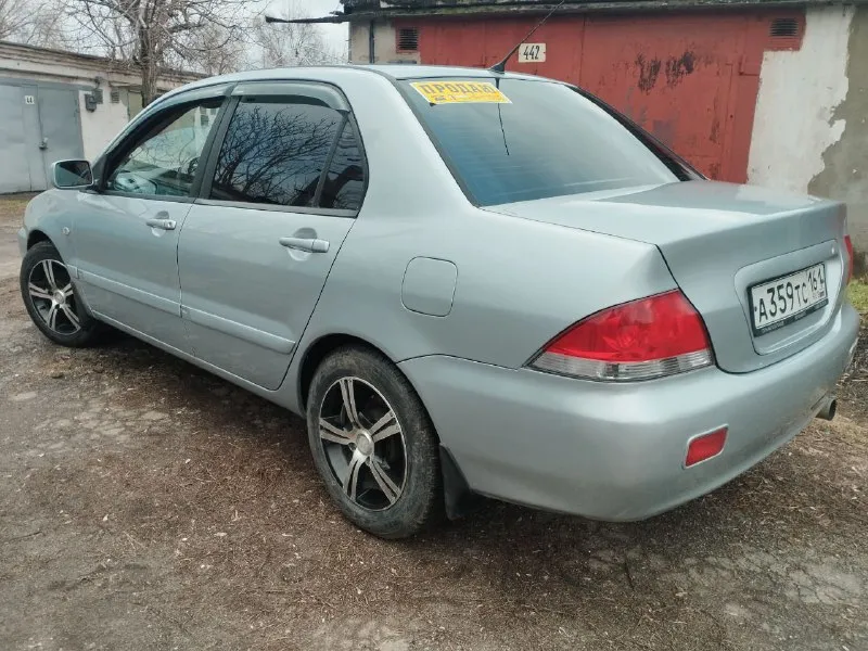 Mitsubishi лансер 9 mitsubishi lancer 9 год выпуска 2005 пробег 248 тысяч км двигатель 1.6 в отличном состоянии, масло не ест не дымит. кпп четко без хрустов и вылетов ручник держит. кондиционер холодит печка греет кузов без гнили и ржавчины. резина отличная зима. литые диски переоформление без проблем карта то сделана находится в мариуполе цена 460 тысяч рублей, торг уместен. +79490250401 📲 tg: олег 📞 звоните: +7(949)0250401 - фотография - 3