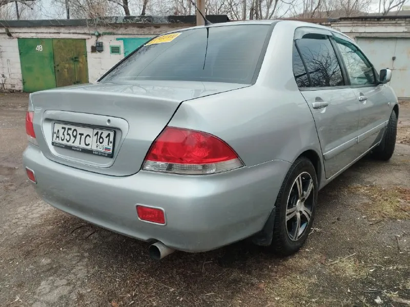 Mitsubishi лансер 9 mitsubishi lancer 9 год выпуска 2005 пробег 248 тысяч км двигатель 1.6 в отличном состоянии, масло не ест не дымит. кпп четко без хрустов и вылетов ручник держит. кондиционер холодит печка греет кузов без гнили и ржавчины. резина отличная зима. литые диски переоформление без проблем карта то сделана находится в мариуполе цена 460 тысяч рублей, торг уместен. +79490250401 📲 tg: олег 📞 звоните: +7(949)0250401 - фотография - 4