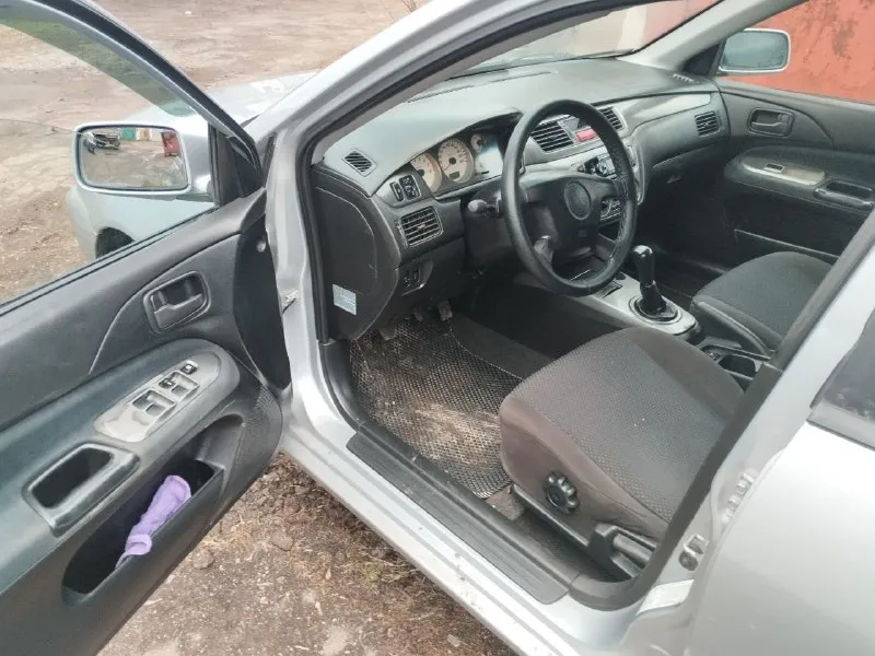 Mitsubishi лансер 9 mitsubishi lancer 9 год выпуска 2005 пробег 248 тысяч км двигатель 1.6 в отличном состоянии, масло не ест не дымит. кпп четко без хрустов и вылетов ручник держит. кондиционер холодит печка греет кузов без гнили и ржавчины. резина отличная зима. литые диски переоформление без проблем карта то сделана находится в мариуполе цена 460 тысяч рублей, торг уместен. +79490250401 📲 tg: олег 📞 звоните: +7(949)0250401 - фотография - 6
