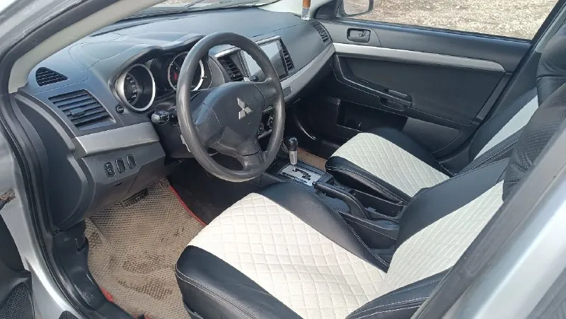 ❗️продам lancer x 2007 года. ❗️ состояние ближе к идеалу ✅ 2х литровый мотор 150 живых лошадей✅ коробка: обслуженный вариатор ( плюсом установлено доп охлождение), переключается без каких либо пинков✅едет отлично. родной пробег: 280.000 тысяч❗️ по двигателю работает отлично без каких либо посторонних звуков ✅ салон ухоженный без каких либо дырок и прочего ✅ всё работает по электрики каждая кнопочка, каждая лампочка светит✅ так же стоит хорошая сигнализация - фотография - 8