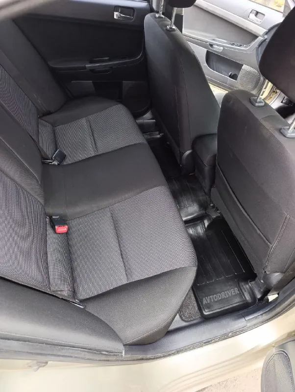 Продам лансер 2009 г. в 2.0 ( механика) 150 л. с. пробег 223 тысячи машина покупалась в донецке в автосалоне в 2009 году, до прошлого года была в одной семье, я второй собственник. состояние хорошее. климат. подогрев сидений. корректор и обогрев зеркал. датчик света и дождя. 4 стеклоподъёмника. мульти руль. макеевка. цена 740 тысяч +79493472594 📞 звоните: +7(949)3472594 - фотография - 9