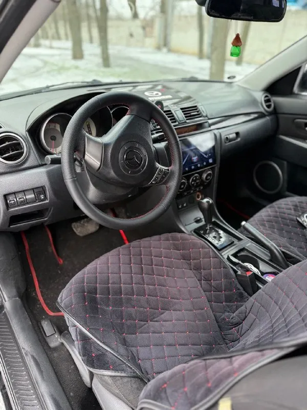 Продам mazda 3🔥 год выпуска:2007🔥 пробег, км:180.000 🔥 модификация:1.6 ат 🔥 тип двигателя: газ/бензин🔥 коробка передач: автомат🔥 привод: передний🔥 тип кузова: седан🔥 koмплeктaция: flash edition🔥 цвет: черный🔥 продажа автомобиля от собственника. автомобиль в богатой комплектации и в ухоженном состоянии. таких хозяйских машин осталось малость. машина на полном ходу, не требует никаких вложений от слова совсем. мотор в идеальном состоянии, не троит, не дымит, не имеет каких либо посторонних звуков, работает идеально как на газу так и не бензине. под капотом ничего не намывал, не подготавливал, чтобы было видно, что мотор сухой, без каких-либо потёков aкпп-в идеальном состоянии, плавность переключения передач, отсутствие рывков и корректность работы в разных режимах. ходовая-мягкая, ничего не стучит, не тарабанит, всё что нужно было - поменяно так же имеется видео, по просьбе отправлю для более лучшего осмотра авто цена 549.999 тысяч возможен пригон по договоренности возможен пригон по договоренности возможен обмен +79495752024 - фотография - 10