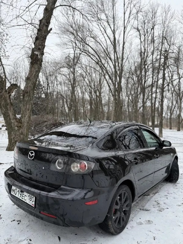 Продам mazda 3🔥 год выпуска:2007🔥 пробег, км:180.000 🔥 модификация:1.6 ат 🔥 тип двигателя: газ/бензин🔥 коробка передач: автомат🔥 привод: передний🔥 тип кузова: седан🔥 koмплeктaция: flash edition🔥 цвет: черный🔥 продажа автомобиля от собственника. автомобиль в богатой комплектации и в ухоженном состоянии. таких хозяйских машин осталось малость. машина на полном ходу, не требует никаких вложений от слова совсем. мотор в идеальном состоянии, не троит, не дымит, не имеет каких либо посторонних звуков, работает идеально как на газу так и не бензине. под капотом ничего не намывал, не подготавливал, чтобы было видно, что мотор сухой, без каких-либо потёков. aкпп-в идеальном состоянии, плавность переключения передач, отсутствие рывков и корректность работы в разных режимах. ходовая-мягкая, ничего не стучит, не тарабанит, всё что нужно было - поменяно. так же имеется видео, по просьбе отправлю для более лучшего осмотра авто. цена:549.999 тысяч возможен пригон по договоренности. возможен обмен. номер для связи:+79495752024 - фотография - 3