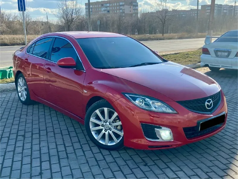 В продаже mazda 6 gh ( 2008 год ) 2.0 акпп двигатель самый надежный 2.0 бензин ( не путать с 1.8! ), работает как положено, без расхода масла ! пробег 190.000 км автомат самый простой и надежный aisin ( гидротрансформатор ), работает без нареканий ! кузов выглядит очень хорошо, без гнили и ржавчины ! имеются некритичные окрасы, большая часть в родной краске ! ходовая без нареканий, обслужена ! хорошая комплектация : приятный раздвоенный выхлоп, 2-х зонный климат-контроль (кондиционер работает), мульти-руль, круиз-контроль, подогрев сидений, электропривод зеркал с подогревом и электроскладыванием и многое другое вин-код читается отлично! переоформление 825.000₽ торг при виде денег ! +7(949)-616-73-96 +7(949)-432-74-21 осмотр донецк, кировский район 📞 звоните: +7(949)6167396 - фотография - 2