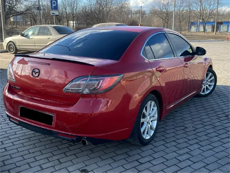 В продаже mazda 6 gh ( 2008 год ) 2.0 акпп двигатель самый надежный 2.0 бензин ( не путать с 1.8! ), работает как положено, без расхода масла ! пробег 190.000 км автомат самый простой и надежный aisin ( гидротрансформатор ), работает без нареканий ! кузов выглядит очень хорошо, без гнили и ржавчины ! имеются некритичные окрасы, большая часть в родной краске ! ходовая без нареканий, обслужена ! хорошая комплектация : приятный раздвоенный выхлоп, 2-х зонный климат-контроль (кондиционер работает), мульти-руль, круиз-контроль, подогрев сидений, электропривод зеркал с подогревом и электроскладыванием и многое другое вин-код читается отлично! переоформление 825.000₽ торг при виде денег ! +7(949)-616-73-96 +7(949)-432-74-21 осмотр донецк, кировский район 📞 звоните: +7(949)6167396 - фотография - 4