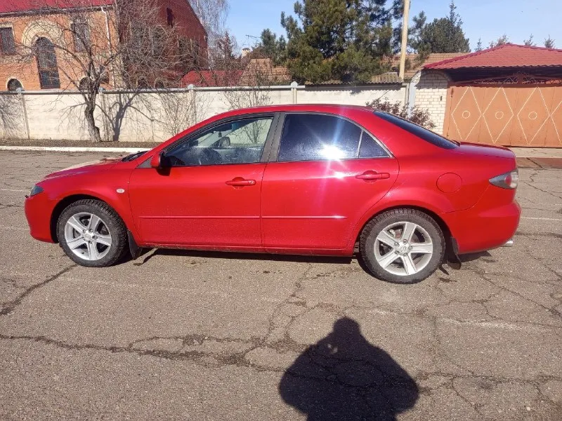 Продам mazda 6 рестайлинг двигатель 2,0 работает хорошо, масло не ест, не дымит газ метан евро 4, коробка автомат переключает шикарно новая ходовая полностью, тормозная система новая, новая резина не гнилая, резвая, экономичная. салон в хорошем состоянии. по комплектации мультируль, кондиционер, 4 стеклоподъемника, электрозеркала с подогревом. круиз контроль, датчик света, датчик дождя, парктроник. магнитола андроид, камера заднего вида, лед оптика, по документам полный порядок, цена 590 000 руб торг, возможен обмен +79591509979 осмотр г. луганск 📞 звоните: +7(959)1509979 - фотография - 7