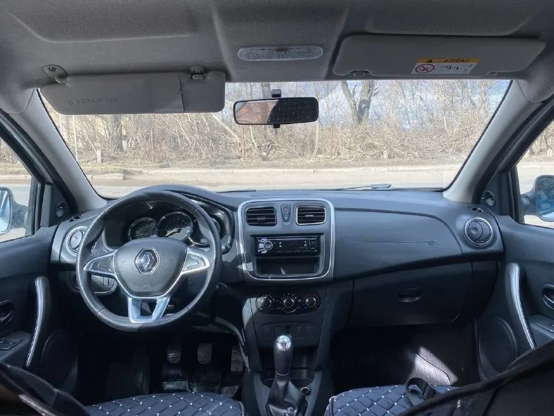 Продам renault logan 1.6 мт, 2018 г. в. 770.000р ходовая плотная, мягкая. двигатель работает отлично. кпп отлично. кузов в хорошем состоянии. салон чистый, ухоженный. кондиционер работает. abs эл. стеклоподъемники. подогрев передних сидений. музыка. сигнализация заводская. осмотр город донецк +79495994099 - фотография - 5