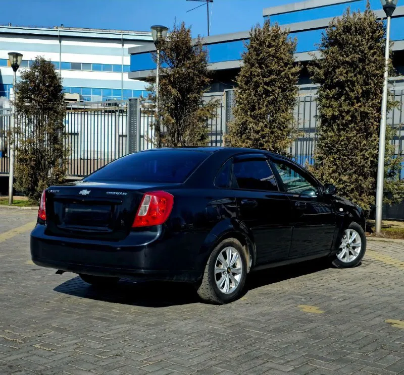 Продам. красивый, надежный, вместительный chevrolet lacetti. год выпуска 2008 пробег 217000 км. любые проверки с вашей стороны приветствуются мкпп 5-ступенчатая мотор 1.6 механика. г. донецк. тел. +79495362484 +79494491943. если не дозвонились, на этом номере есть telegram. авто в хорошем. состояние как внешнее, так и техническое без гнили, коррозии и ржавчины. остекление заводское, в дтп не участвовала, все швы и герметики заводские. техническое состояние без нареканий. подвеска отрабатывает мягко и комфортно мотор работает как швейцарские часы. салон целый чистый и опрятный комплектация: полный электропакет. кондиционер (холодит как сумасшедший), abs, srs airbag гидроусилитель руля электроподъемники стёкол электрозеркала с подогревом противотуманки корректор фар центральный замок сигнализацыя sheriff г. донецк цена торг - фотография - 6