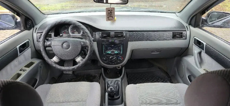 Продам. красивый, надежный, вместительный chevrolet lacetti. год выпуска 2008 пробег 217000 км. любые проверки с вашей стороны приветствуются мкпп 5-ступенчатая мотор 1.6 механика. г. донецк. тел. +79495362484 +79494491943. если не дозвонились, на этом номере есть telegram. авто в хорошем. состояние как внешнее, так и техническое без гнили, коррозии и ржавчины. остекление заводское, в дтп не участвовала, все швы и герметики заводские. техническое состояние без нареканий. подвеска отрабатывает мягко и комфортно мотор работает как швейцарские часы. салон целый чистый и опрятный комплектация: полный электропакет. кондиционер (холодит как сумасшедший), abs, srs airbag гидроусилитель руля электроподъемники стёкол электрозеркала с подогревом противотуманки корректор фар центральный замок сигнализацыя sheriff г. донецк цена торг - фотография - 7