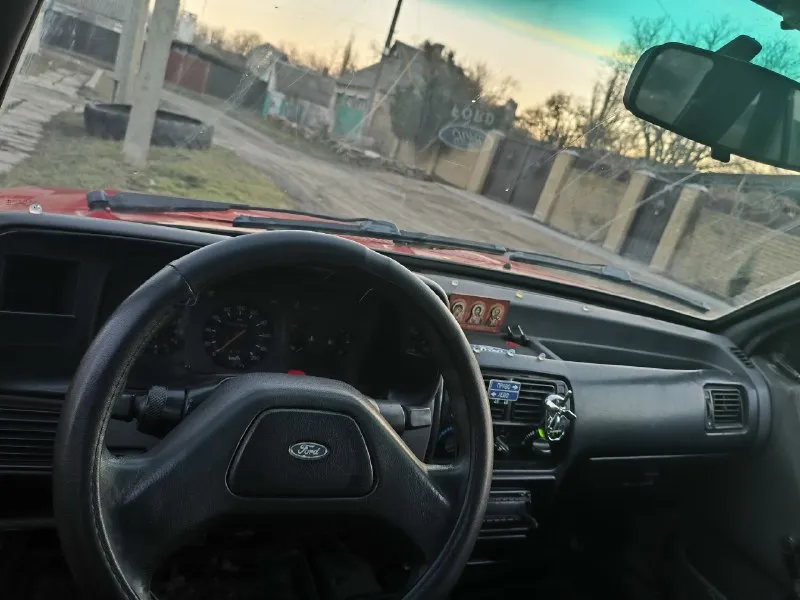 Продам ford escort 1986г. несмотря на возраст, авто в хорошем состоянии: днище целое, новый аккумулятор, новый стартер, два комплекта резины на дисках, газ/бензин. цена 150000 руб. разумный торг у капота. г. амвросиевка, +79493774068 📞 звоните: +7(949)3774068 - фотография - 2
