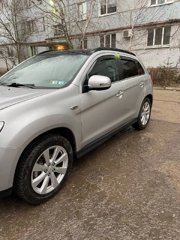 Продам mitsubishi outlander sport 2.4,2015 год(на путать с двигателями 1.6 2л). подключаемый полный привод. авто в прекрасном состоянии, очень богатая комплектация: под рулевые лепестки, камера заднего вида, партроник, бесключевой доступ, кнопка start-stop, bluetooth, панорамная крыша, датчики давления в шинах, датчик дождя, климат контроль, хорошая музыка,2 комплекта ковриков. ручник, подлокотник и ручка переключения передач перетянуты в натуральную кожу. масло менял каждые 5-6 тыс. км. пробег реальный 138000 миль. высокий клиренс, хорошая динамика, запчасти очень дешёвые. авто стоит на 180 регионе. цена 1500000. +79494152556 📲 tg: @igor_malikov19 📞 звоните: +7(949)4152556 - фотография - 4