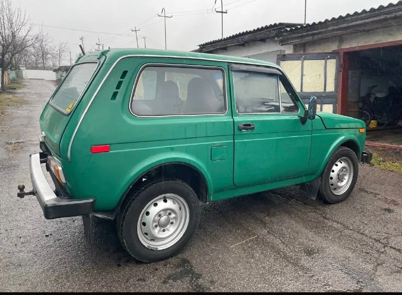 Продается нива 1981 года. двигатель 1,6 л. 5-ти ступенчатая газ и бензин цена:350.000 торг уместен. к машине можно приобрести прицеп и багажник. номер телефона: +79493731168. все вопросы по телефону. 📞 звоните: +7(949)3731168 - фотография - 3