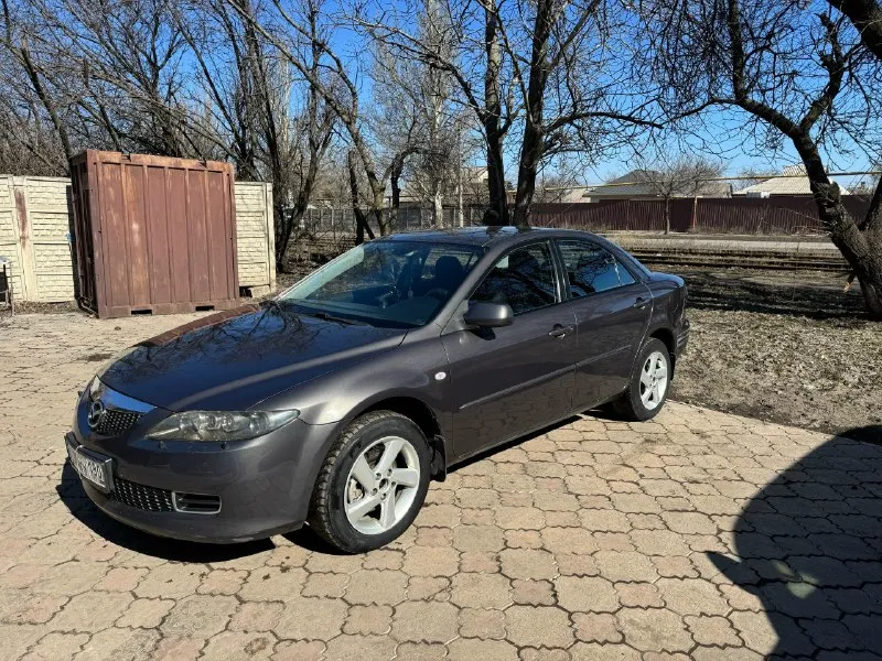 Продаю mazda 6 gg рестайлинг 2005 года. 🚘 автомобиль в отличном состоянии, без аварий и повреждений. все стекла оригинальные, vin-номер в порядке. ходовая и двигатель в норме, мотор капиталили на 240 тысячах километров, масло меняю регулярно. 🔧 двигатель 2 литра, бензин. шестиступенчатая коробка передач работает как часы. управление удобное, клиренс высокий благодаря установленным проставкам. 📏 салон просторный и удобный, багажник вместительный. новые фары с линзами и бронепленкой. 📍 осмотр возможен в донецке. цена 525 тысяч рублей, возможен небольшой торг. 📞 свяжитесь для дополнительной информации и записи на осмотр по телефону :+79494327455 📞 звоните: +7(949)4327455 - фотография - 2