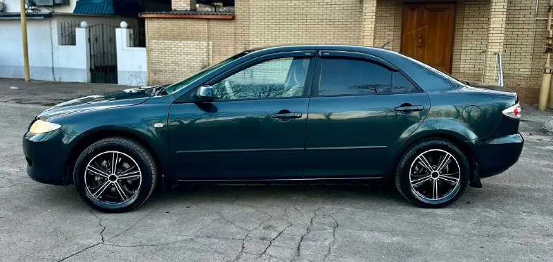 Срочно очень срочно 469.тыс. руб. торг при осмотре. mazda 6 2005 год.2.0 механика. авто в очень хорошем состоянии для своих лет. вложений не требует. автотека зелень кузов не гнилой. дно, пороги, стаканы, ланджероны в отличном состоянии. мотор работает как часы. не дымит не троит тянет отлично. ходовая без посторонних звуков, коробка тоже в отличном состоянии. салон чистый и ухоженный. богатая комплектация. климат-контроль, датчики света и дождя, круиз контроль, текшен-контроль, гур, подушки безопасности, и многое другое. также установлена магнитола на android системе, с блютузом wifi, навигатором, камера заднего вида, литые диски r16,тонеровка, сигнализация,2ключей. документы в полном порядке юредически чистая. любое переоформление. осмотр донецк +79493114199 - фотография - 5