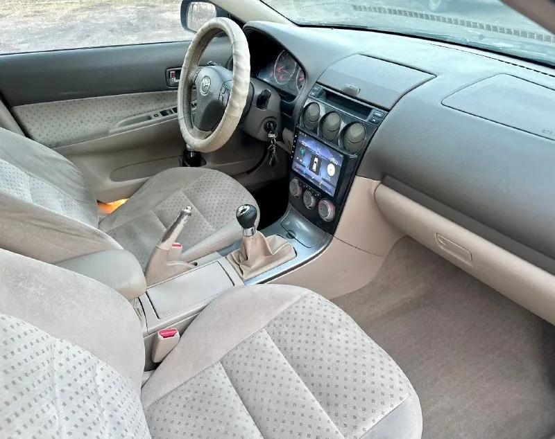 Срочно очень срочно 469.тыс. руб. торг при осмотре. mazda 6 2005 год.2.0 механика. авто в очень хорошем состоянии для своих лет. вложений не требует. автотека зелень кузов не гнилой. дно, пороги, стаканы, ланджероны в отличном состоянии. мотор работает как часы. не дымит не троит тянет отлично. ходовая без посторонних звуков, коробка тоже в отличном состоянии. салон чистый и ухоженный. богатая комплектация. климат-контроль, датчики света и дождя, круиз контроль, текшен-контроль, гур, подушки безопасности, и многое другое. также установлена магнитола на android системе, с блютузом wifi, навигатором, камера заднего вида, литые диски r16,тонеровка, сигнализация,2ключей. документы в полном порядке юредически чистая. любое переоформление. осмотр донецк +79493114199 - фотография - 9