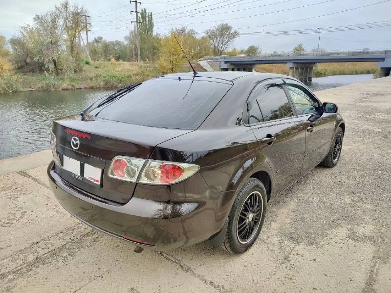 🇯🇵 mazda 6 gg 💰цена: 670 000р 🏢город: мариуполь 📅год выпуска: 2007 🧾пробег: 191 123км. ⚙️двигатель: 2.3 ⛽топливо: бензин ⚙️кпп: механика 6 ст. 📞 телефон: +7-949-727-41-51 +7-949-551-91-52 +7-989-263-55-56 💾 описание: ❄️ климат контроль ⚡ полный электропакет 🔥 подогрев сидений 💪 гидроусилитель руля 📦 вместительный багажник 🌧️🔆 датчики света и дождя ⚫ кожаный мульти руль ⚫ кожаные салон recaro 🎶 музыка bose 🔑 два ключа и руководство по эксплуатации ➕ зимняя резина 2025 года на новых литых дисках. - фотография - 4