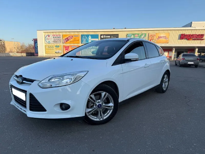 Ford focus, 2012 г. атмосферный бензиновый двигатель 1.6 л. пробег — 170 500 км. автомобиль в хорошем состоянии: — кузов оцинкован, стекла оригинальные, все системы безопасности исправны. — максимальная комплектация: датчики света и дождя, двухзонный климат-контроль, мультируль, подогрев зоны дворников, все 4 электростеклоподъемника, складывание зеркал, парктроники и многое другое. — двигатель работает ровно, без посторонних шумов и ошибок. — коробка передач переключается четко. — полностью обслужен, не требует дополнительных вложений. пройден техосмотр, готов к постановке на учет в мрэо. цена: 750 000 руб. город: донецк. телефон: +7 949 371-08-26 (есть telegram). по запросу вышлем видеообзор автомобиля. - фотография - 1