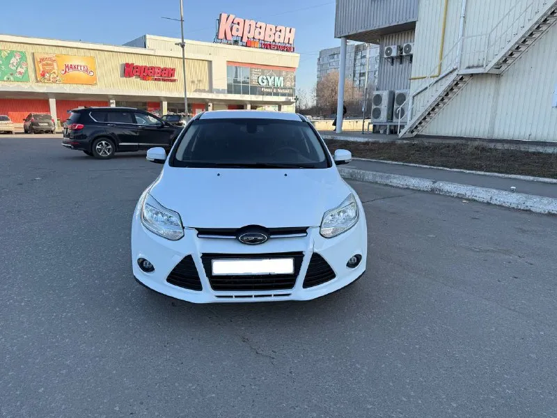 Ford focus, 2012 г. атмосферный бензиновый двигатель 1.6 л. пробег — 170 500 км. автомобиль в хорошем состоянии: — кузов оцинкован, стекла оригинальные, все системы безопасности исправны. — максимальная комплектация: датчики света и дождя, двухзонный климат-контроль, мультируль, подогрев зоны дворников, все 4 электростеклоподъемника, складывание зеркал, парктроники и многое другое. — двигатель работает ровно, без посторонних шумов и ошибок. — коробка передач переключается четко. — полностью обслужен, не требует дополнительных вложений. пройден техосмотр, готов к постановке на учет в мрэо. цена: 750 000 руб. город: донецк. телефон: +7 949 371-08-26 (есть telegram). по запросу вышлем видеообзор автомобиля. - фотография - 3