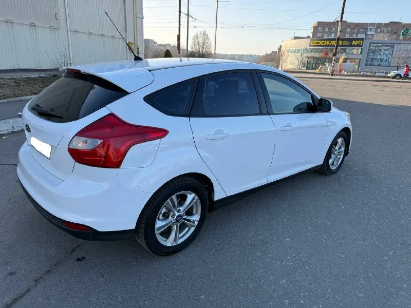 Ford focus, 2012 г. атмосферный бензиновый двигатель 1.6 л. пробег — 170 500 км. автомобиль в хорошем состоянии: — кузов оцинкован, стекла оригинальные, все системы безопасности исправны. — максимальная комплектация: датчики света и дождя, двухзонный климат-контроль, мультируль, подогрев зоны дворников, все 4 электростеклоподъемника, складывание зеркал, парктроники и многое другое. — двигатель работает ровно, без посторонних шумов и ошибок. — коробка передач переключается четко. — полностью обслужен, не требует дополнительных вложений. пройден техосмотр, готов к постановке на учет в мрэо. цена: 750 000 руб. город: донецк. телефон: +7 949 371-08-26 (есть telegram). по запросу вышлем видеообзор автомобиля. - фотография - 5