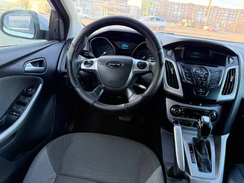 Ford focus, 2012 г. атмосферный бензиновый двигатель 1.6 л. пробег — 170 500 км. автомобиль в хорошем состоянии: — кузов оцинкован, стекла оригинальные, все системы безопасности исправны. — максимальная комплектация: датчики света и дождя, двухзонный климат-контроль, мультируль, подогрев зоны дворников, все 4 электростеклоподъемника, складывание зеркал, парктроники и многое другое. — двигатель работает ровно, без посторонних шумов и ошибок. — коробка передач переключается четко. — полностью обслужен, не требует дополнительных вложений. пройден техосмотр, готов к постановке на учет в мрэо. цена: 750 000 руб. город: донецк. телефон: +7 949 371-08-26 (есть telegram). по запросу вышлем видеообзор автомобиля. - фотография - 9