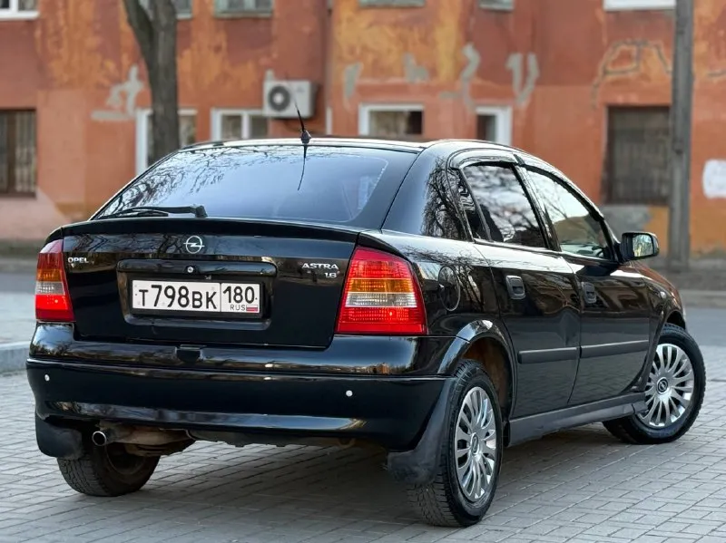Продам opel astra 1.6 надежный автомобиль 2003г. выпуска в отличном состоянии! 1 владелец, без дтп! пробег родной 193.000! идеальное состояние кузова, ржавчины нет совсем, пороги целые, не гнилые. по технической части нареканий нет, мотор работает плавно и ровно, коробка тоже работает мягко. подвеска в хорошем состоянии, не стучит, не гремит. комплектация. кондиционер, подогрев сидений, 2 подушки безопасности, 2 эл. стеклоподъемника, подогрев зеркал, электрорегулеровка зеркал, диски r15, хорошая музыка, комплект ключей, остальные вопросы по телефону +79494958326 цена 435тыс ₽ торг у капота хорошему покупателю. плохая связь звоните. telegram +79494958326 📲 tg: petya maklyak 📞 звоните: +7(949)4958326 - фотография - 4