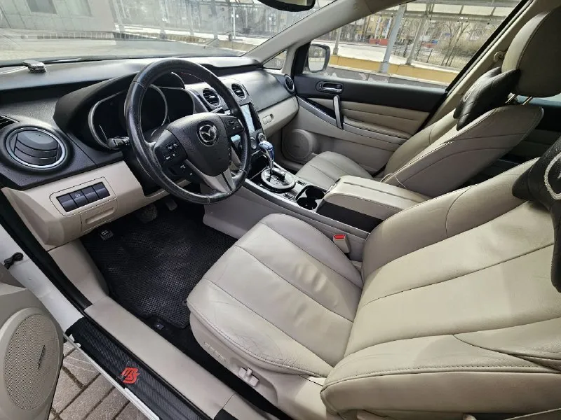 Mazda cx-7 2010г рестайл 2,3 бензин 186т км полный привод. авто в хорошем состоянии. без дтп, 2 косметических окраса(до 250микрон) стекла и железо вкруг родные! /коробка/электрика/кондиционер все работает без нюансов! комплектация максимальная, кроме люка - безключевой доступ, климат контроль, круиз контроль, музыка bose, электросиденья с памятью и подогревом, камера заднего вида, парктроник перед/зад и др. 900т руб 9495213411 📞 звоните: +7(949)5213411 - фотография - 6