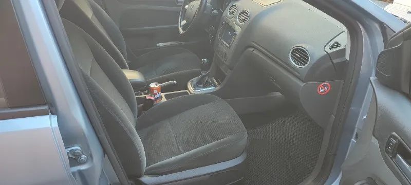 Продам свой автомобиль ford фокус 2 в 2016 году авто было пригнано из германии, с тех пор, я единственный владелец. автомобиль в очень хорошем состоянии, масло, фильтра, расходники менялись вовремя. кузов в отличном состоянии, рыжиков и ржавчины нет. салон велюр в идеальном состоянии. 👉 двигатель 1.6 бензин 115л 👉 оригинальный пробег 285 000км 👉 мкпп комплектация ghia * датчик дождя * датчик света * круиз контроль * абс * есп * обогрев лобового и заднего стекла * 2х зонный климат * магнитола андроид * велюровый салон * задний парктроник * все 4 стеклоподъёмника автоматические * 6 подушек безопасности * птф * в круг дисковые тормоза * фаркоп отличный, комфортный автомобиль. не разу не подводил. делать ничего не нужно, сел и поехал. 2 комплекта резины, 3 комплекта ковриков. г. луганск цена 660 000₽ +7 (959) 111-11-02 📞 звоните: +7(959)1111102 - фотография - 7