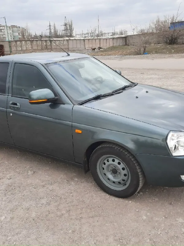 Ваз приора, 2011 г. в. , 1.6 (16 кл), мкпп, 158 000 км продаю свою приору 2011 года (я 4-й хозяин по птс). родной пробег 158 000 км. езжу каждый день. кузов живой, ровный, цвет зеленый металлик. денег на обслуживание не жалели — ставили только качественные брендовые запчасти. по технике вложений ноль — сел и поехал! мотор 1.6, 16 клапанов («шестнарь») гур передние электростеклоподъемники установлены безвтыковые поршня (клапана не гнет!) комплект грм gates (заменен 20 000 км назад) новые катушки зажигания bremi и свечи ngk новое сцепление luk (заменено 20 000 км назад) новый дроссель 54 мм поменяны все радиаторы, все патрубки заменены на силиконовые новый аккумулятор подвеска полностью перебрана: стоят стойки ss20 -30мм в круг свежие тормоза - brembo кузов поварен и полностью обработан антикором полный выхлоп «гранта спорт» (паук 4-1, трасса 51 мм) — звучит приятно и басисто сделана хорошая шумоизоляция (двери, пол, капот, багажник) — в салоне действительно тихо 2 комплек 📞 звоните: +7(949)4069153 - фотография - 3