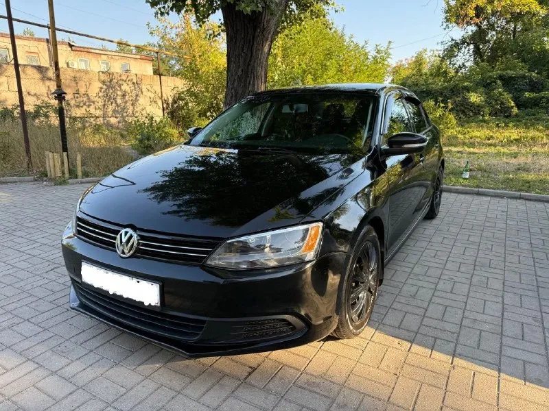 Срочно!!! volkswagen jetta vi, 2013, 1.8at 170 л. с. с пробегом 63359 мили (102000 км. ). кожаный салон. гаражное хранение. комплект зимней резины в подарок. пройдено то. цена 1100000 руб. без торга!!!тел. +79490409212. макеевка - фотография - 5