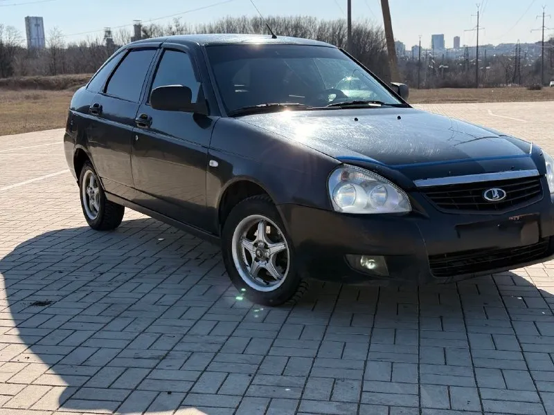 Lada priora 2013г 250000пробег 1хозяин птс оригинал без залогов и ограничений полный пакет документов + диагностическая карта. мотор обслужен, работает ровно, не троит, не дымит. коробка без нареканий. по ходовой вопросов нет. ходовая ss20. дно, стаканы и днище в идеальном состоянии. машина всегда хранилась в сухом гараже. из доп. опций : сигнализация с обратной связью, центральный замок, камера заднего вида, магнитола на андроиде с большим количеством функций, хорошая акустика, abs, airbag. задние парктроники. весь салон обтянут красивей кожей с перфорацией +потолок. шипованные скаты, практически новые. авто вложений не требует от слова совсем. более детальней по телефону. цена 345000 г. донецк +79490981171 +79494378767 - фотография - 2