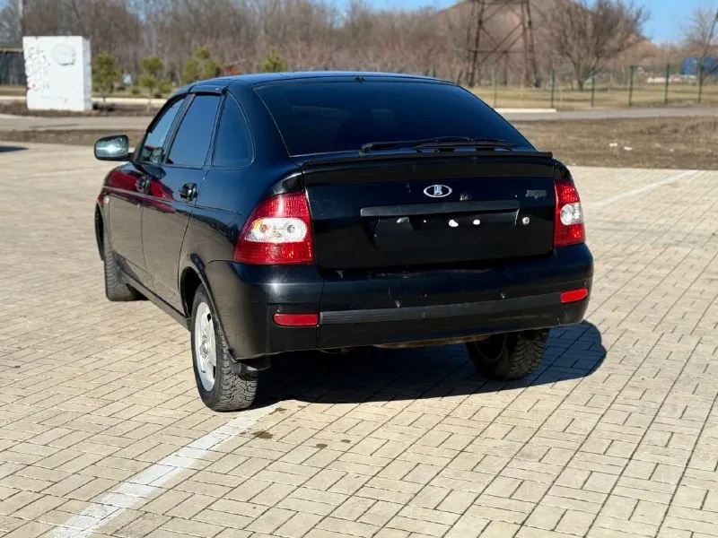 Lada priora 2013г 250000пробег 1хозяин птс оригинал без залогов и ограничений полный пакет документов + диагностическая карта. мотор обслужен, работает ровно, не троит, не дымит. коробка без нареканий. по ходовой вопросов нет. ходовая ss20. дно, стаканы и днище в идеальном состоянии. машина всегда хранилась в сухом гараже. из доп. опций : сигнализация с обратной связью, центральный замок, камера заднего вида, магнитола на андроиде с большим количеством функций, хорошая акустика, abs, airbag. задние парктроники. весь салон обтянут красивей кожей с перфорацией +потолок. шипованные скаты, практически новые. авто вложений не требует от слова совсем. более детальней по телефону. цена 345000 г. донецк +79490981171 +79494378767 - фотография - 3