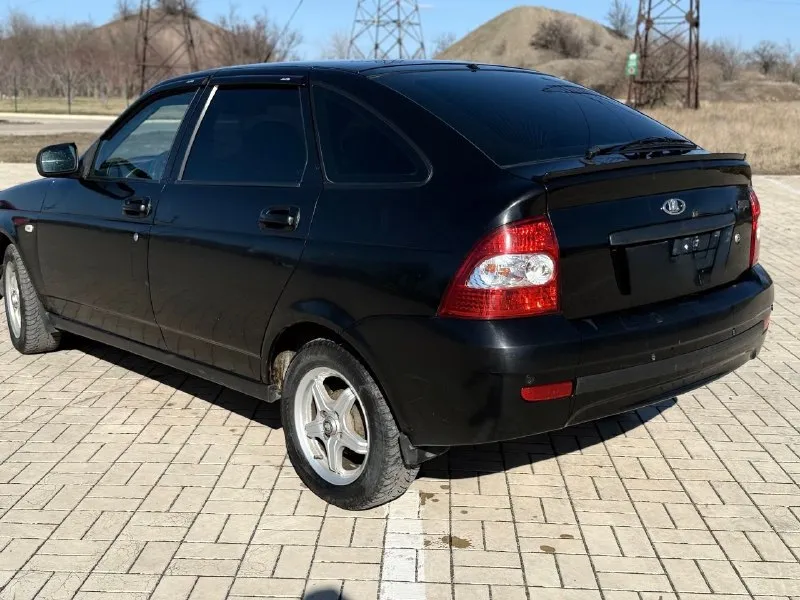 Lada priora 2013г 250000пробег 1хозяин птс оригинал без залогов и ограничений полный пакет документов + диагностическая карта. мотор обслужен, работает ровно, не троит, не дымит. коробка без нареканий. по ходовой вопросов нет. ходовая ss20. дно, стаканы и днище в идеальном состоянии. машина всегда хранилась в сухом гараже. из доп. опций : сигнализация с обратной связью, центральный замок, камера заднего вида, магнитола на андроиде с большим количеством функций, хорошая акустика, abs, airbag. задние парктроники. весь салон обтянут красивей кожей с перфорацией +потолок. шипованные скаты, практически новые. авто вложений не требует от слова совсем. более детальней по телефону. цена 345000 г. донецк +79490981171 +79494378767 - фотография - 4