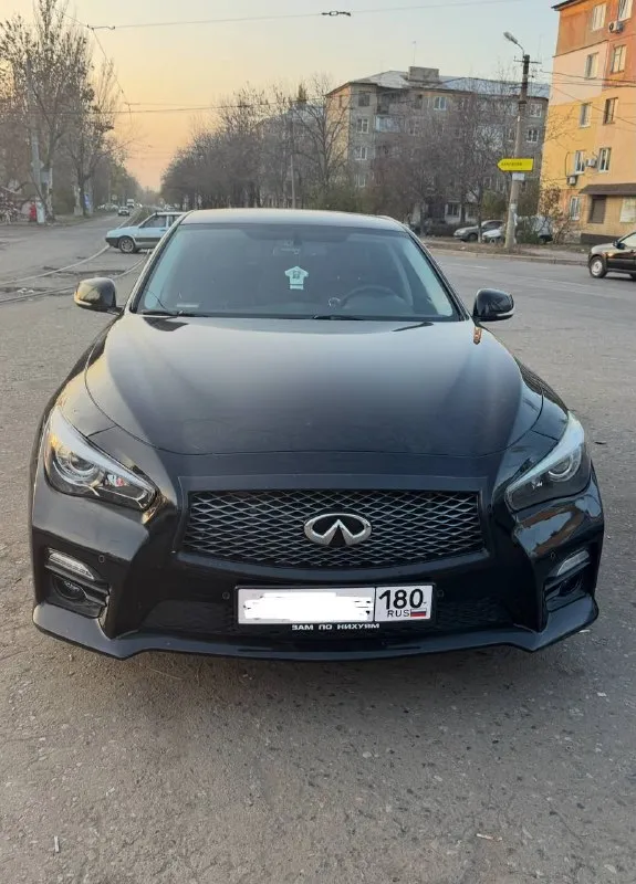Продаю infiniti q50 2.0t (211 л. с.) 2014 г. в. продаю свой ухоженный infiniti q50 2014 года выпуска, оснащенный мощным и экономичным 2.0-литровым турбированным двигателем (211 л. с.). автомобиль в хорошем состоянии. пробег реальный. 185 тыс комплектация: полный набор опций для комфорта и безопасности. два комплекта резины: летняя и зимняя резина на оригинальных дисках infiniti. гаражное хранение: автомобиль всегда в идеальном состоянии, защита от внешних воздействий европейская версия. техническое состояние: автомобиль полностью обслужен, все то проводились вовремя. двигатель работает ровно, без нареканий. проверка любое сто за ваш счет. машина моя личная, во владении три года. осмотр в донецке не упустите возможность стать владельцем стильного и мощного автомобиля! tg - @fin_209 - фотография - 1