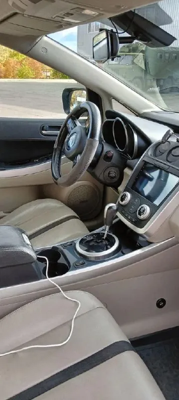Продам mazda cx-7, мотор 2.3 л, турбо, 248 л. с. , 2007 год. максимальная комплектация: кожаный салон, подогревы и электрорегулировка сидений, датчик дождя и света, электрозеркала с подогревом, музыка bose, android магнитола, бесключевой доступ, парктроники. по авто: 1) перебрана ходовая, новые тормозные диски и колодки (заменены в круг); 2) двигатель и коробка работают без нареканий, заменены масла в двигателе и коробке, раздатке, редукторе; 3) заменен компрессор кондиционера (новый) номер для звонков: +79490226487 📞 звоните: +7(949)0226487 - фотография - 8