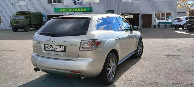 Продам mazda cx-7, мотор 2.3 л, турбо, 248 л. с. , 2007 год. максимальная комплектация: кожаный салон, подогревы и электрорегулировка сидений, датчик дождя и света, электрозеркала с подогревом, музыка bose, android магнитола, бесключевой доступ, парктроники. по авто: 1) перебрана ходовая, новые тормозные диски и колодки (заменены в круг); 2) двигатель и коробка работают без нареканий, заменены масла в двигателе и коробке, раздатке, редукторе; 3) заменен компрессор кондиционера (новый) номер для звонков: +79490226487 📞 звоните: +7(949)0226487 - фотография - 9