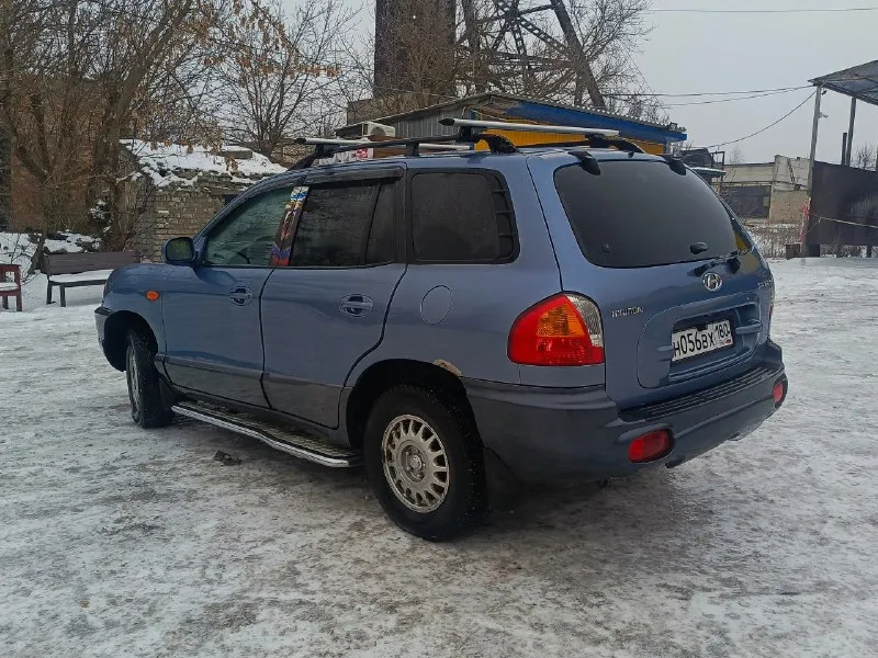 Hyundai santa fe classic 2000 год : 2.0 газ/бензин кпп: механическая 5ст. продажа от собственника. чистые документы, полное переоформление. автомобиль был пригнан в 2016 году, все 10 лет в одной семье. стоит контрактный мотор, ставился полтора года назад, вписан в птс. семейный автомобиль, в отличном состоянии, в родном окрасе. стоит газ евро4. по комплектации: кондиционер (заправлен), 4 эсп, электрорегулировка и обогрев зеркал, android магнитола с камерой заднего вида. ходовка в идеальном состоянии, стоит новая печка, велюр под чехлами как новый. цена: 650 000руб, торг реальному покупателю шахтерский район +7 951 839 88 77 кирилл 📞 звоните: +7(951)8398877 - фотография - 5