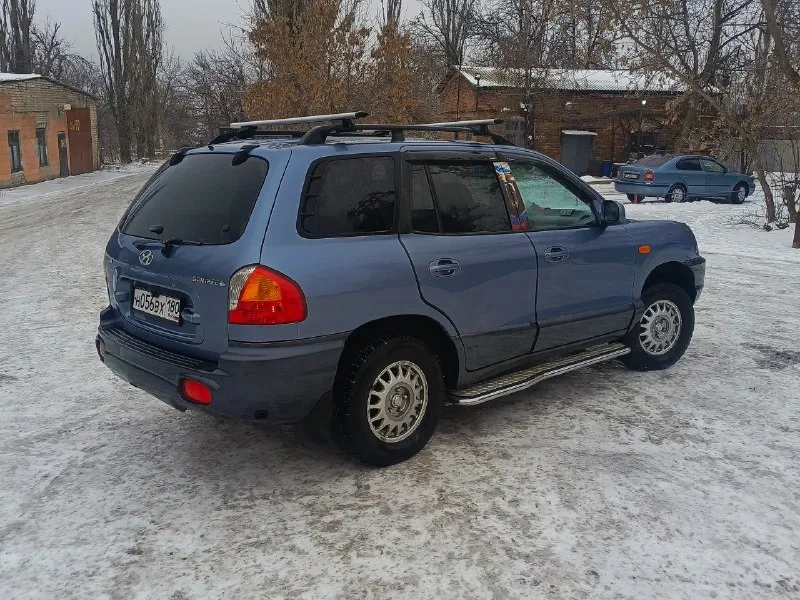 Hyundai santa fe classic 2000 год : 2.0 газ/бензин кпп: механическая 5ст. продажа от собственника. чистые документы, полное переоформление. автомобиль был пригнан в 2016 году, все 10 лет в одной семье. стоит контрактный мотор, ставился полтора года назад, вписан в птс. семейный автомобиль, в отличном состоянии, в родном окрасе. стоит газ евро4. по комплектации: кондиционер (заправлен), 4 эсп, электрорегулировка и обогрев зеркал, android магнитола с камерой заднего вида. ходовка в идеальном состоянии, стоит новая печка, велюр под чехлами как новый. цена: 650 000руб, торг реальному покупателю шахтерский район +7 951 839 88 77 кирилл 📞 звоните: +7(951)8398877 - фотография - 7