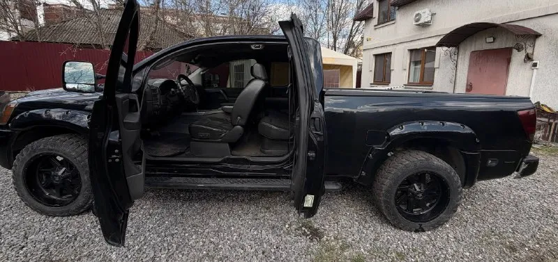 Nissan titan, 2005 г. двигатель 5,6 автомат, бензин, установлено газовое оборудование, состояние отличное пробег 176 000 оригинальный по кузову 2 окраса, все стёкла родные. двигатель работает тихо, без посторонних звуков, не дымит, масло не берет. ходовка перебрана. любые проверки на вашем сто. вся интересующая информация по телефону. цена 1 500 000 р. +79493012414 - фотография - 7