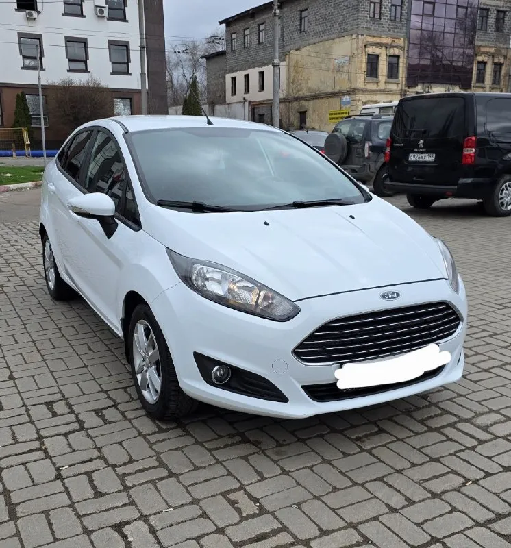 Продам ford fiesta 2016г. тех осмотр пройден, диагностическая карта на руках. пробег 110000км двигатель 1.6 работает идеально акпп переключает мягко, без толчков и пинков кузов в родной краске стекла заводские включая лобовое ходовка не стучит, отрабатывает отлично кондиционер холодит, печка греет задние парктроники, сигнализация с автозапуском в машине работает всё, без вложений, сел и поехал переоформление в мрэо без проблем осмотр донецк цена 865000₽ +79493910310 - фотография - 2