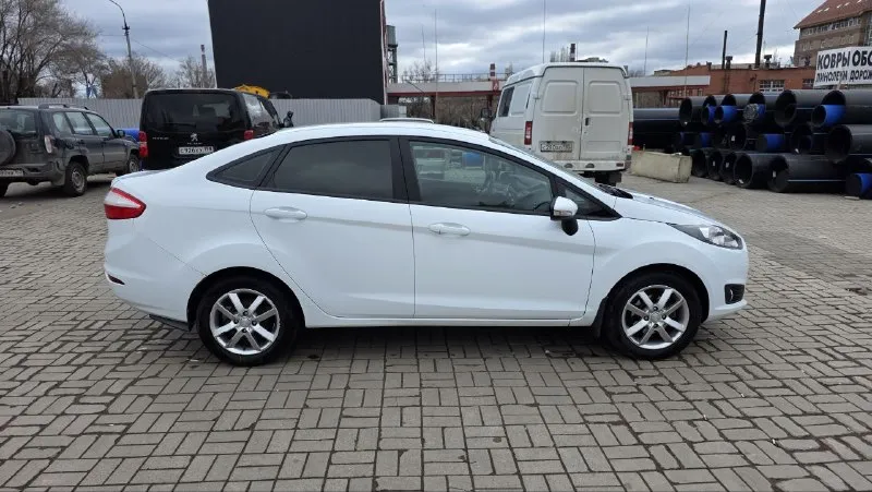 Продам ford fiesta 2016г. тех осмотр пройден, диагностическая карта на руках. пробег 110000км двигатель 1.6 работает идеально акпп переключает мягко, без толчков и пинков кузов в родной краске стекла заводские включая лобовое ходовка не стучит, отрабатывает отлично кондиционер холодит, печка греет задние парктроники, сигнализация с автозапуском в машине работает всё, без вложений, сел и поехал переоформление в мрэо без проблем осмотр донецк цена 865000₽ +79493910310 - фотография - 8