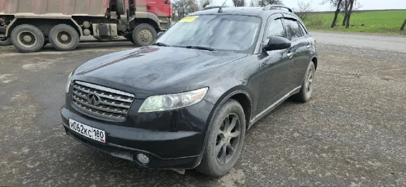 Infiniti fx35 год:2004 двигатель: 3.5л акпп: 5ст продам infiniti в максимальной комплектации, с активным круиз радаром и. т.д мотор в хорошем состоянии, акпп в отличном состоянии, переключает плавно, по ходовой требуется замена косточек стабилизатора, цена низкая рынка. более подробно по телефону цена 670.000р. +79497138247 - фотография - 1