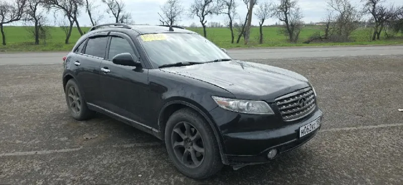 Infiniti fx35 год:2004 двигатель: 3.5л акпп: 5ст продам infiniti в максимальной комплектации, с активным круиз радаром и. т.д мотор в хорошем состоянии, акпп в отличном состоянии, переключает плавно, по ходовой требуется замена косточек стабилизатора, цена низкая рынка. более подробно по телефону цена 670.000р. +79497138247 - фотография - 2