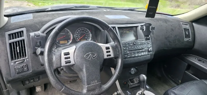 Infiniti fx35 год:2004 двигатель: 3.5л акпп: 5ст продам infiniti в максимальной комплектации, с активным круиз радаром и. т.д мотор в хорошем состоянии, акпп в отличном состоянии, переключает плавно, по ходовой требуется замена косточек стабилизатора, цена низкая рынка. более подробно по телефону цена 670.000р. +79497138247 - фотография - 5
