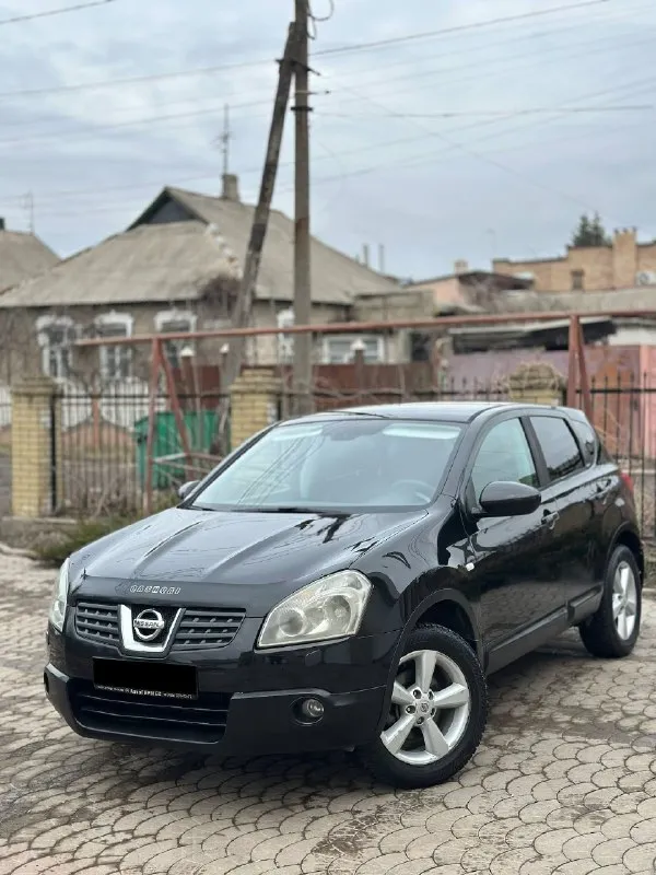 Продам автомобиль в идеальном состоянии! марка- nissan qashai обьем двигателя 2.0 бензин. год выпуска 2008 коробка- автомат работает идеально. пробег- 216.ооо км (техосмотр пройден!) максимальная комплектация: полностью кожаный салон. без ключевой доступ. кнопка старт стоп. круиз контроль. двух зонный климат контроль. авто свет. авто дождь. 4 стеклоподъемника. подогрев сидений. кожаный мультируль. туманки. громкая связь bluetooth. заводские диски r17. в двух словах отличный паркетник на каждый день, приятный расход 9л комфортный вместительный, и самое главное дешевый в обслуживании. осмотр в любом месте цена 800.000₽ срочно 🚨 только сейчас телефон +7949-989-62-00 если не доступен звоните еще раз связь очень плохая ▶️смотреть больше фото◀️ 📲 tg: @alligator_0888 📞 звоните: +7(949)9896200 - фотография - 1
