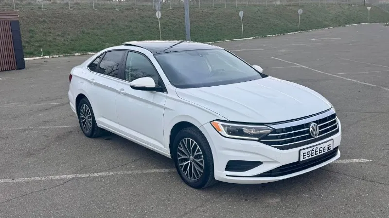 Jetta se plus 2021 юридически чиста и без ограничений. ✅цена -1735000 рублей 2021 год 95 тыс км родного пробега двигатель 1.4 турбо, обычный восьми ступенчатый автомат aisin. два ключа, два комплекта резины(зима абсолютно новая) заводской автозапуск двигателя, подогрев всех сидений а также руля. электропривод водительского сидения. led фары а также задние стопы. дистроники, датчики предотвращения дтп. датчики слепых зон, датчик дождя и света. салон в идеальном состоянии. ✅ничего делать не нужно, машина полностью обслужена. г. донецк +79494153100 (тут же телеграмм) 📞 🇷🇺 звоните: +79494153100 - фотография - 1