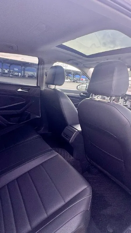 Jetta se plus 2021 юридически чиста и без ограничений. ✅цена -1735000 рублей 2021 год 95 тыс км родного пробега двигатель 1.4 турбо, обычный восьми ступенчатый автомат aisin. два ключа, два комплекта резины(зима абсолютно новая) заводской автозапуск двигателя, подогрев всех сидений а также руля. электропривод водительского сидения. led фары а также задние стопы. дистроники, датчики предотвращения дтп. датчики слепых зон, датчик дождя и света. салон в идеальном состоянии. ✅ничего делать не нужно, машина полностью обслужена. г. донецк +79494153100 (тут же телеграмм) 📞 🇷🇺 звоните: +79494153100 - фотография - 9